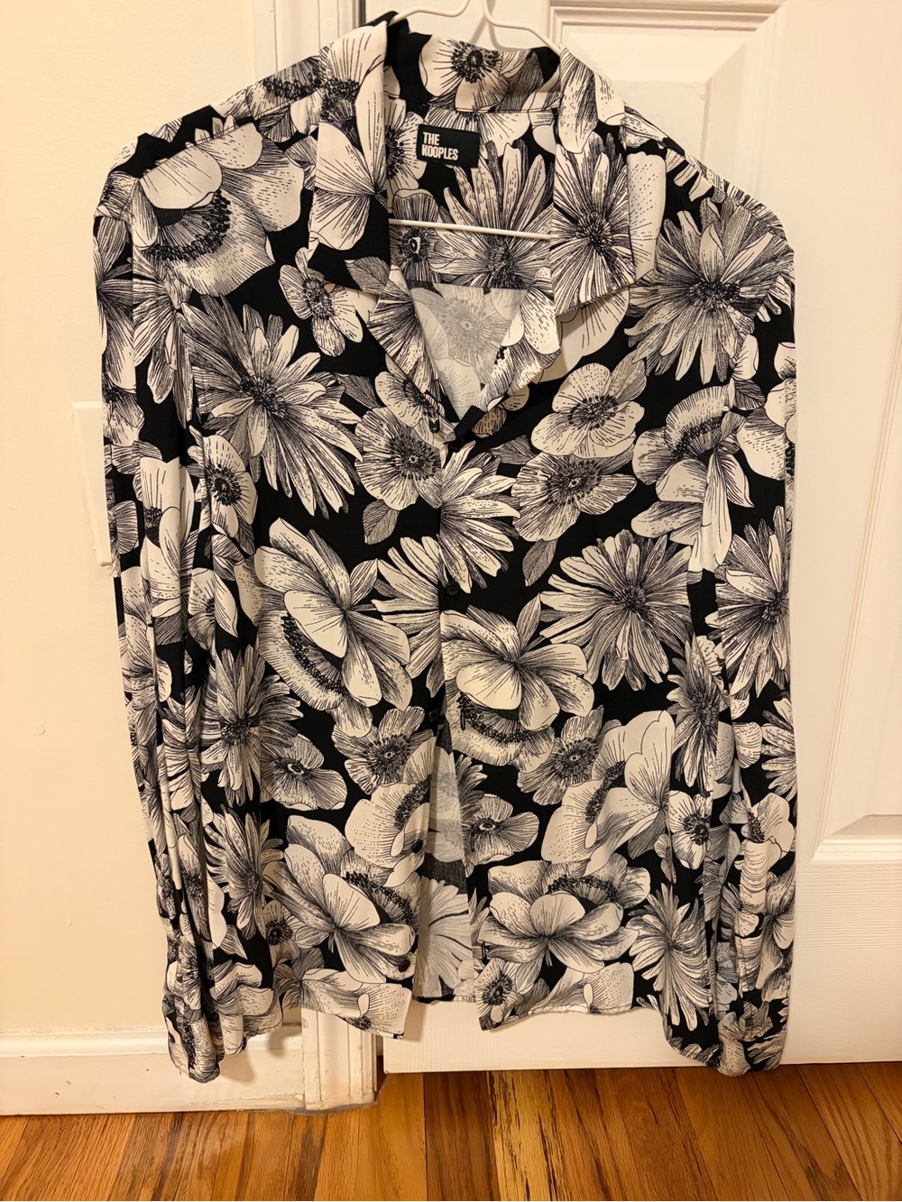 Black and White man Floral Print Shirt Xs but can fit nicely woman size Xs/S